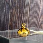 luxurious serving tray with a golden dome-shaped cover with a ring handle