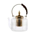 Clear glass teapot with a wood 