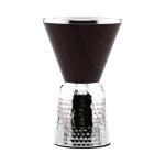 An incense burner made of silver with a strainer