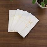 legant White Envelopes with Golden Floral Design