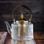 Luxury undulating glass teapot with gold accents and wooden handle