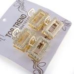 مجموعة مشابك شعر مستطيلة بإطار مفتوح وملمس مميز