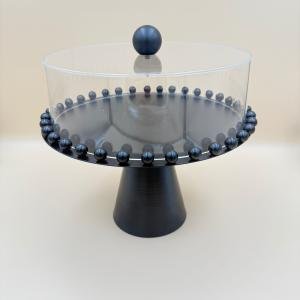 طبق كيك دائري بقاعدة مستديرة من الحديد الأسود