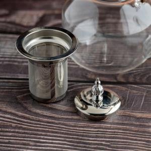 إبريق شاي زجاجي أنيق بمصفاة فضية ومقبض خشبي