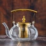 إبريق شاي زجاجي بمقبض ذهبي ومرشح